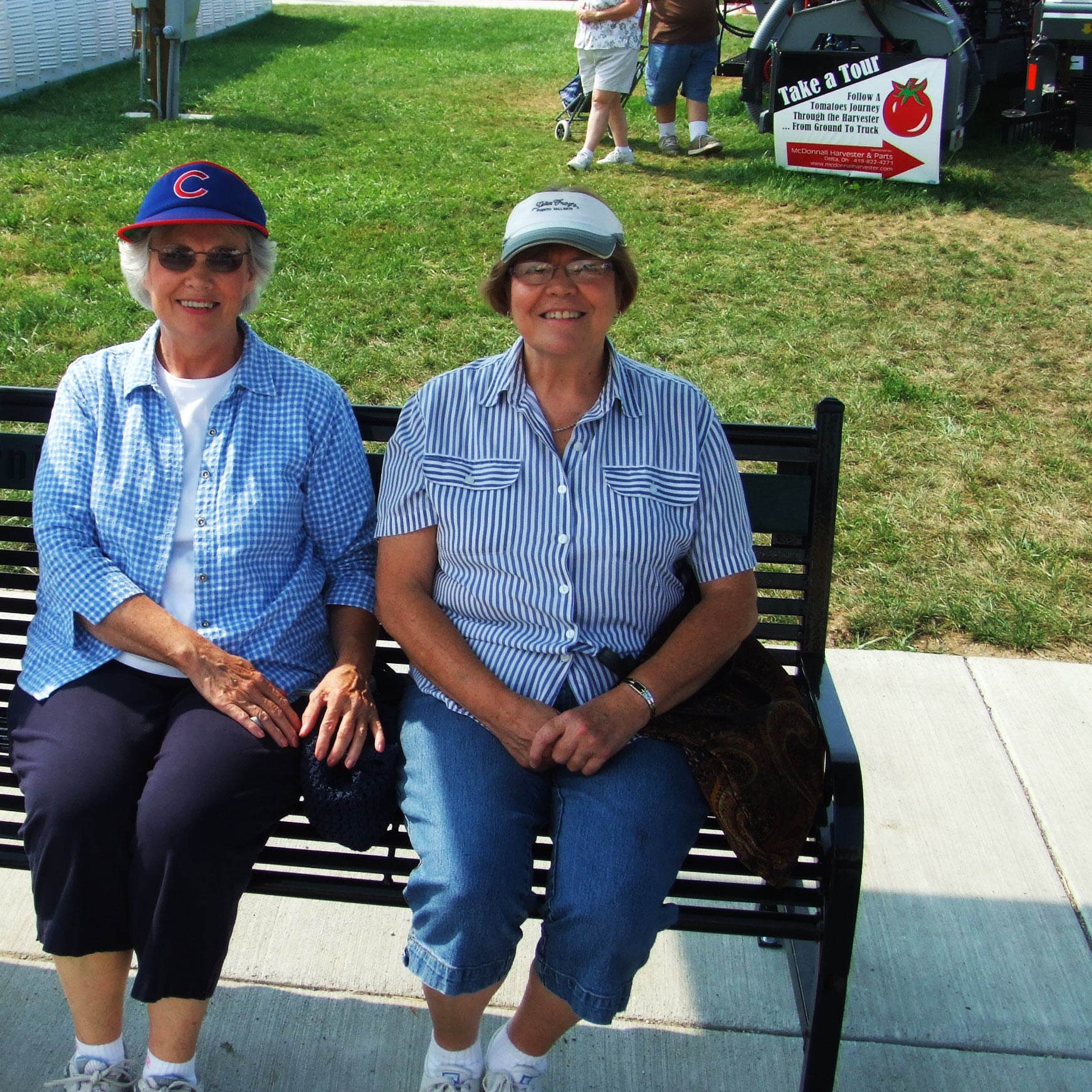 Friends enjoying a donated park bench from OCC Outdoors